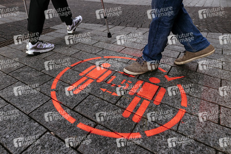 Symbolfoto Corona-Piktogramm