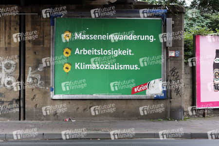 Ein Plakat der Kampagne 'Grüner Mist' in Köln
