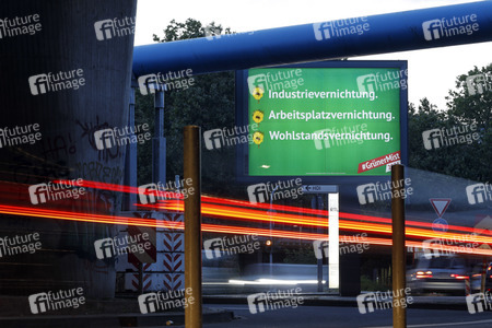 Ein Plakat der Kampagne 'Grüner Mist' in Köln