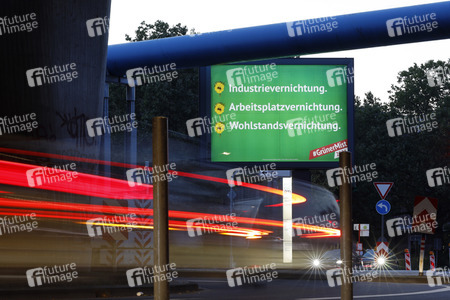 Ein Plakat der Kampagne 'Grüner Mist' in Köln