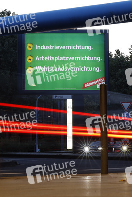 Ein Plakat der Kampagne 'Grüner Mist' in Köln