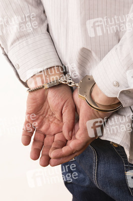 Symbolfoto Handschellen