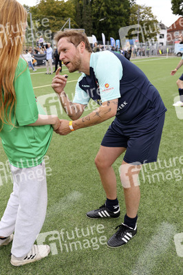 Benefiz-Fußballspiel 'Kicken mit Herz' 2023 in Hamburg