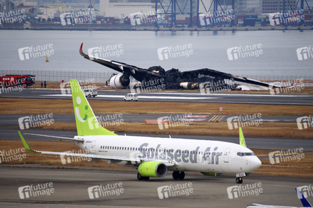 Flugzeugkollision in Tokio