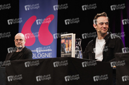 Joël Dicker und Christian Berkel auf der lit.Cologne 2025 in Köln