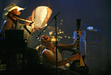 Malcolm 'Hank Williamson' Arison, Stefan 'Russ T. Rocket' Buehler