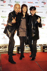 Rudolf Schenker, Klaus Meine (Scorpions) mit Begleitung