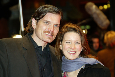 Götz Otto mit Partnerin