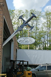 OCC Firmenschild an Werkstatt