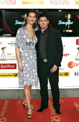 Tim Mälzer mit Partnerin