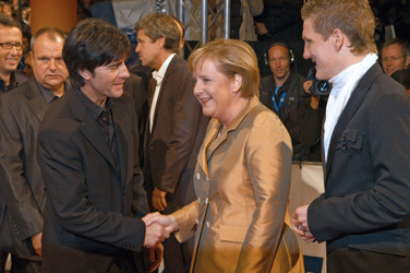 Joachim 'Jogi' Löw, Angela Merkel, Bastian Schweinsteiger