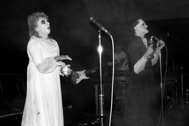 Guggi (Derek Rowan), Gavin Friday