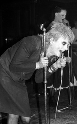 Guggi (Derek Rowan), Gavin Friday