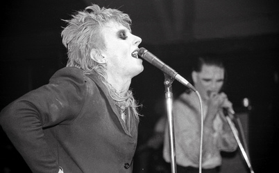 Guggi (Derek Rowan), Gavin Friday