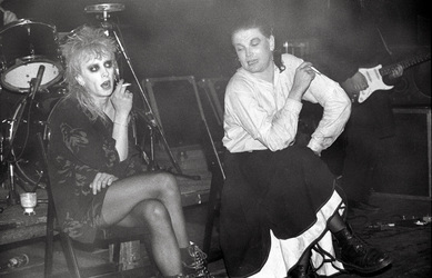 Guggi (Derek Rowan), Gavin Friday