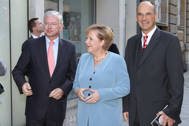 Roland Koch, Angela Merkel, Manuel Herder