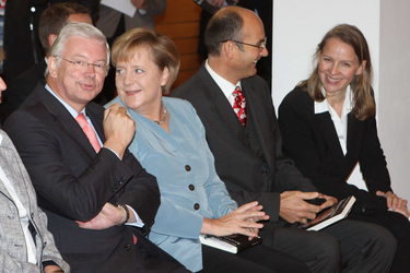 Roland Koch, Angela Merkel, Manuel Herder