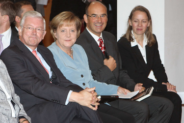 Roland Koch, Angela Merkel, Manuel Herder