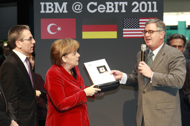 Martin Jetter, Angela Merkel, Samuel Palmisano