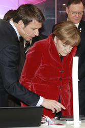 René Obermann, Angela Merkel