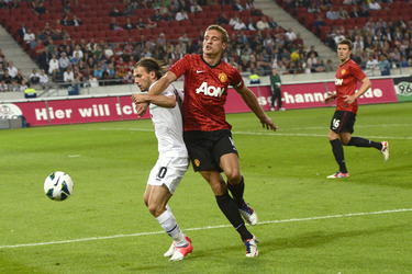Szabolcs Huszti, Nemanja Vidic, Michael Carrick
