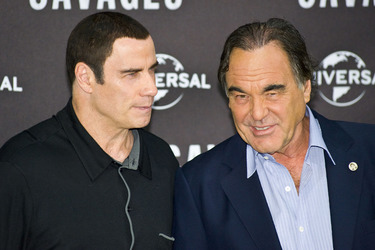 John Travolta, Oliver Stone