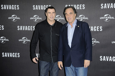 John Travolta, Oliver Stone