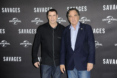 John Travolta, Oliver Stone