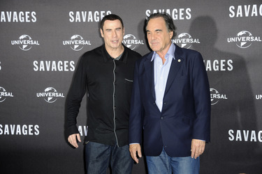 John Travolta, Oliver Stone