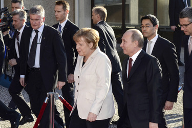 Angela Merkel, Wladimir Putin, Philipp Rösler