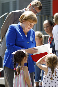 Angela Merkel besucht Caritas Zentrum in Köln