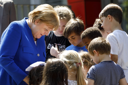 Angela Merkel besucht Caritas Zentrum in Köln