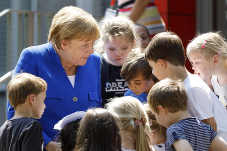 Angela Merkel besucht Caritas Zentrum in Köln