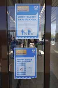 Symbolfoto Corona Schutzmaßnahmen beim Einkaufen