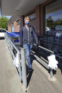 Symbolfoto Corona Schutzmaßnahmen beim Einkaufen