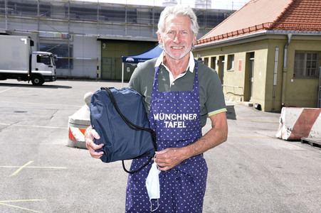 Spendenaktion mit Paul Breitner in München