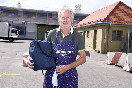 Spendenaktion mit Paul Breitner in München