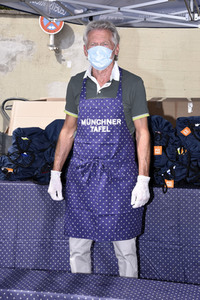 Spendenaktion mit Paul Breitner in München