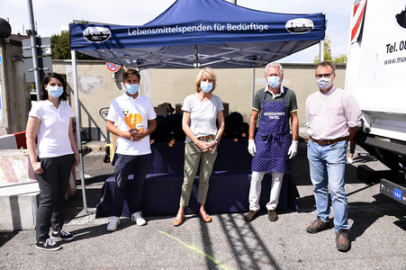 Spendenaktion mit Paul Breitner in München