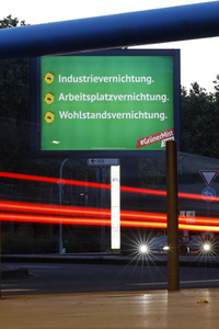 Ein Plakat der Kampagne 'Grüner Mist' in Köln