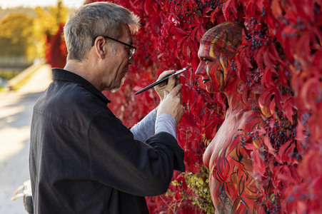 NATURE ART: Red Color Wall Bodypainting