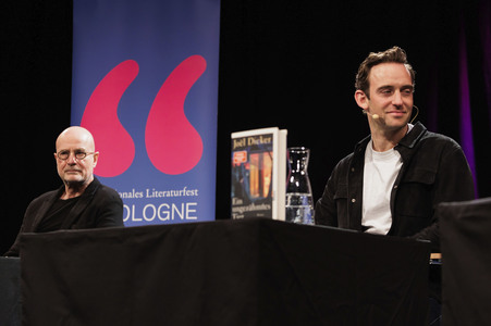 Joël Dicker und Christian Berkel auf der lit.Cologne 2025 in Köln