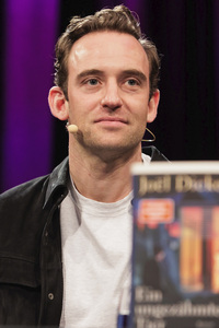 Joël Dicker und Christian Berkel auf der lit.Cologne 2025 in Köln