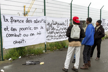 Flüchtlinge im Flüchtlingslager in Calais