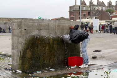 Flüchtlinge im Flüchtlingslager in Calais