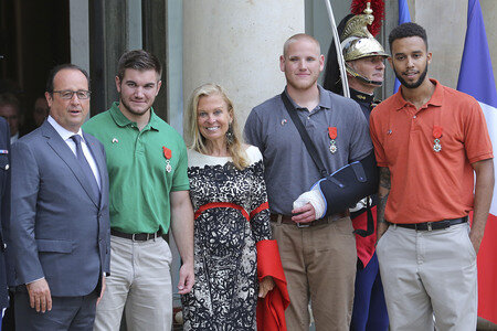 French President Francois Hollande Receives Train Attack Heroes At Elysee Palace
