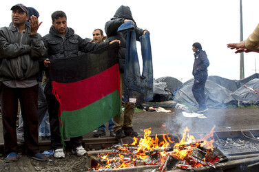Flüchtlinge im Flüchtlingslager in Calais